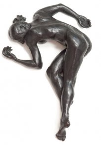 top view of bronze sculpture of a female nude lying down