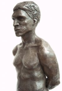 lateral frontal view of bust of bronze sculpture of male nude standing figure