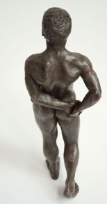 cranial dorsal view of bronze sculpture of male nude standing figure