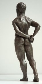 dorsal lateral view of bronze sculpture of male nude standing figure