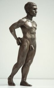 lateral frontal view of bronze sculpture of male nude standing figure