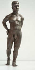frontal lateral view of bronze sculpture of male nude standing figure