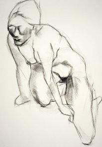 Marijke kneeling and leaning on her arms