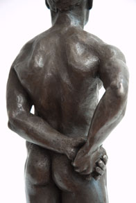 Bronze sculpture of a male nude standing